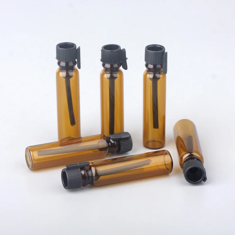 100 kozarcev/veliko 1ml Mini Prazno Eterična Olja Primeru Prenosni Amber Steklenici ponovno napolniti Stekleničke Parfuma Epruveto Vzorec za Darilo