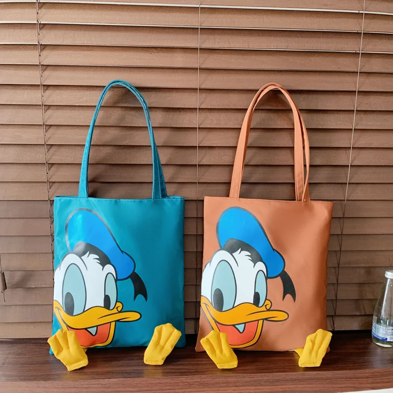 Disney Donald Duck lady nakupovalno vrečko študent šolsko torbo nova risanka vrečko ženski platneni vrečki nakupovalno vrečko otrok, starš-otrok vrečko