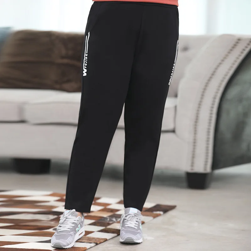 Nove jesensko zimske plus velikost hlače za ženske svoboden priložnostne velike elastični pas pismo dolge športne hlače 3XL 4XL 5XL 6XL 7XL